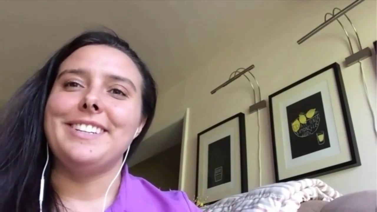 Amber speaking to camera in her video testimonial