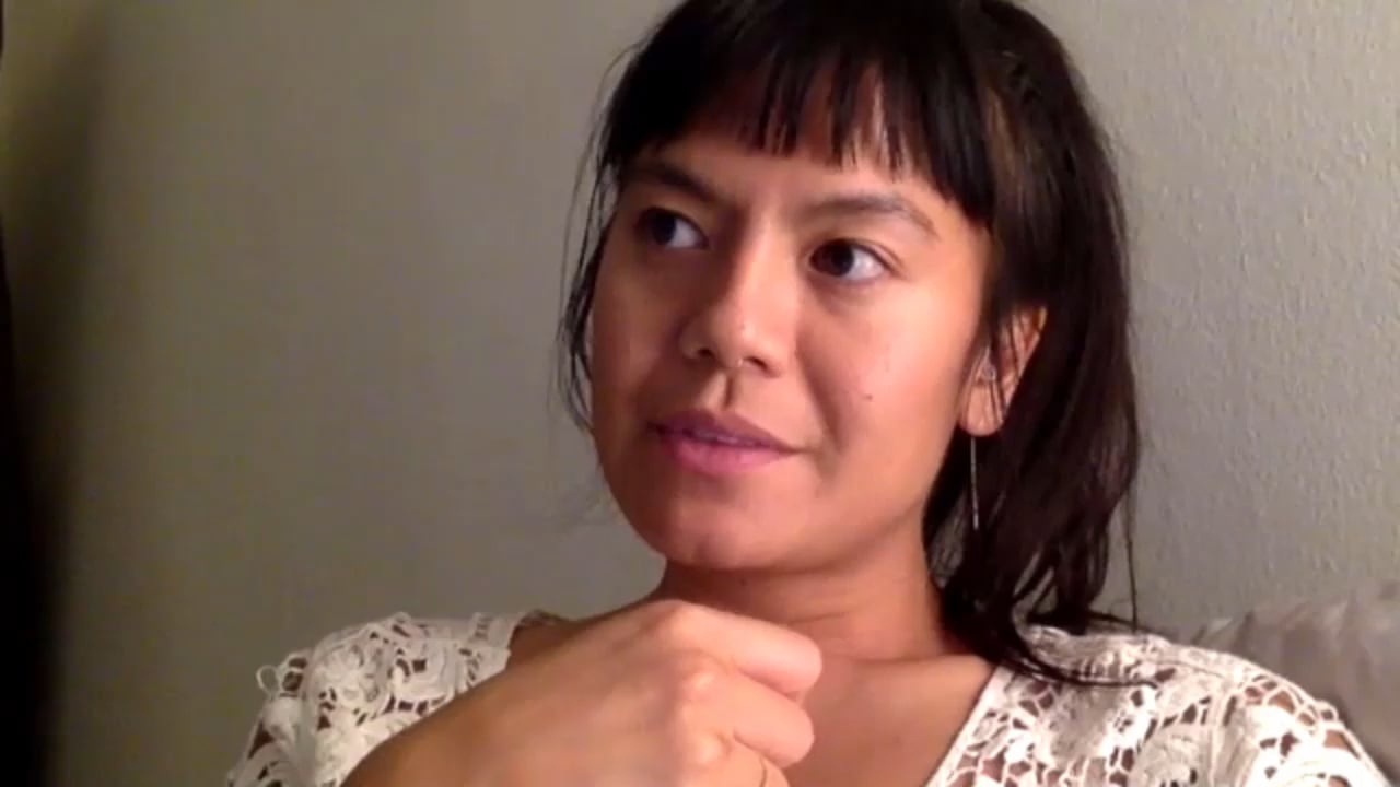 Jen speaking to camera in her video testimonial